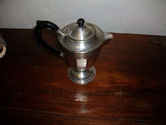 Sliver plated coffee /tea pot with black handle